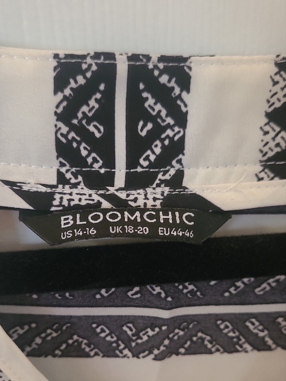 BloomChic Black and Cream Geometric Midi Dress. Bin 5 - Picture 2 of 2